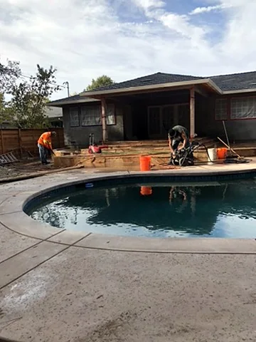 Before: Pool deck before the new flagstone
